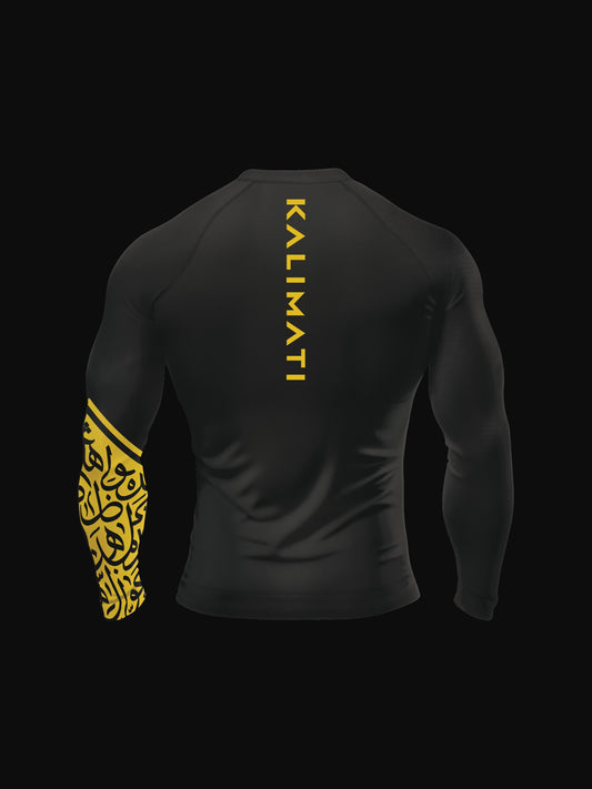 Black longsleeve rashguard with arabic print, used for jiu-jitsu and other martial arts (e.g. MMA). This product features a beautiful, unique arabic calligraphy print on its left sleeve, emphasizing energy and flow.  Also contains brand name KALIMATI along the back. Backside view. Yellow print color.
